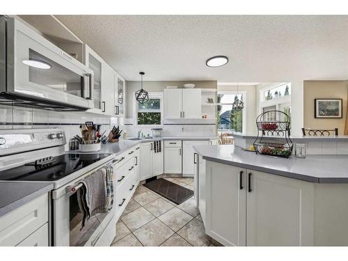 140 Arbour Butte Road Nw, Calgary, AB - Indoor Photo Showing Kitchen