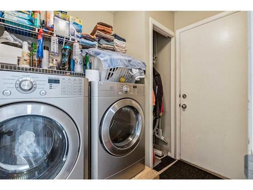 140 Arbour Butte Road Nw, Calgary, AB - Indoor Photo Showing Laundry Room