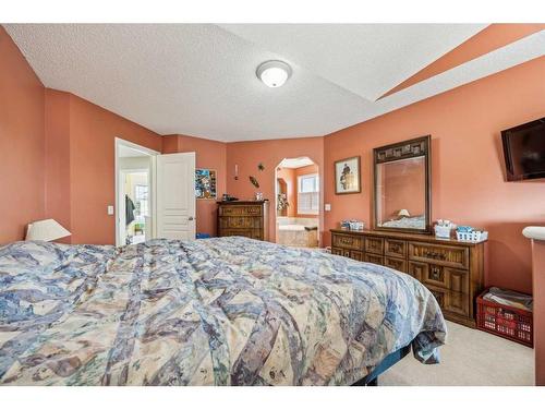 140 Arbour Butte Road Nw, Calgary, AB - Indoor Photo Showing Bedroom