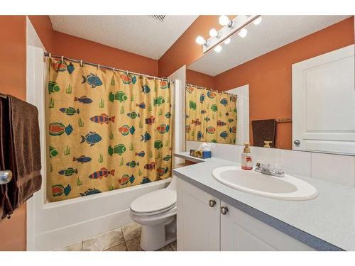 140 Arbour Butte Road Nw, Calgary, AB - Indoor Photo Showing Bathroom