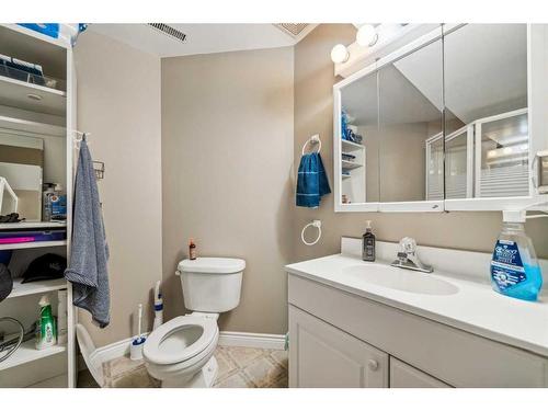 140 Arbour Butte Road Nw, Calgary, AB - Indoor Photo Showing Bathroom