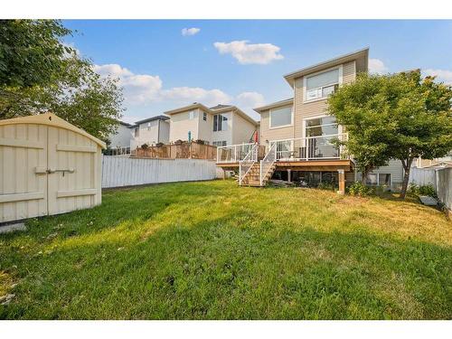 140 Arbour Butte Road Nw, Calgary, AB - Outdoor With Backyard