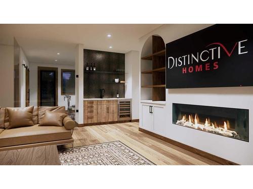 432 Mountain Tranquility Place, Canmore, AB - Indoor Photo Showing Living Room With Fireplace