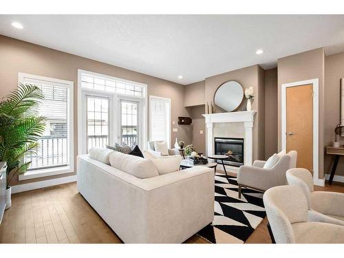 4404 33 Avenue Sw, Calgary, AB - Indoor Photo Showing Living Room With Fireplace