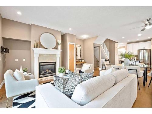 4404 33 Avenue Sw, Calgary, AB - Indoor Photo Showing Living Room With Fireplace