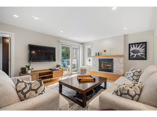 1108 Lake Placid Drive Se, Calgary, AB - Indoor Photo Showing Living Room With Fireplace