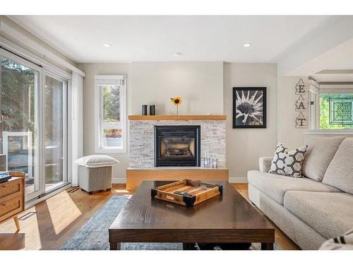 1108 Lake Placid Drive Se, Calgary, AB - Indoor Photo Showing Living Room With Fireplace