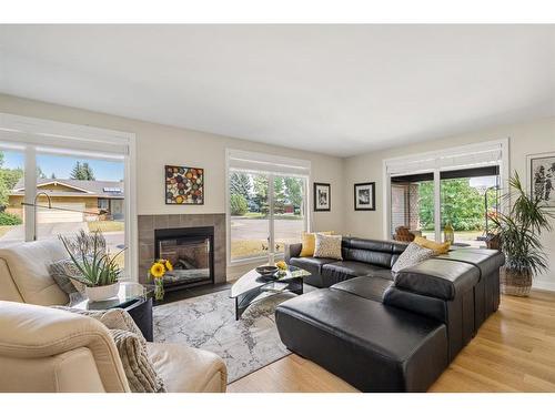 1108 Lake Placid Drive Se, Calgary, AB - Indoor Photo Showing Living Room With Fireplace