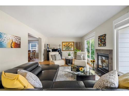 1108 Lake Placid Drive Se, Calgary, AB - Indoor Photo Showing Living Room With Fireplace