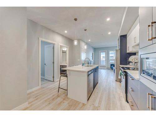 105-138 Sage Valley Common Nw, Calgary, AB - Indoor Photo Showing Kitchen With Upgraded Kitchen