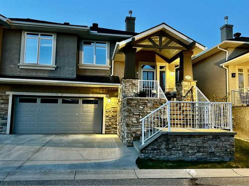 22 Discovery Woods Villas Sw, Calgary, AB - Outdoor With Facade