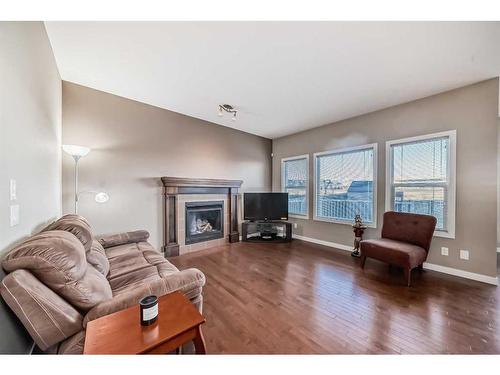 22 Silverado Plains Common Sw, Calgary, AB - Indoor Photo Showing Living Room With Fireplace