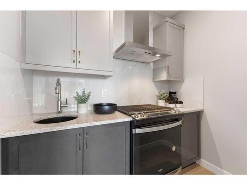 125 Corner Glen Avenue Ne, Calgary, AB - Indoor Photo Showing Kitchen With Upgraded Kitchen