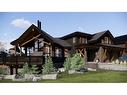 443 Mountain Tranquility Place, Canmore, AB  - Outdoor With Deck Patio Veranda With Facade 