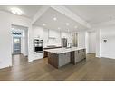 301-120 Marina Cove Se, Calgary, AB  - Indoor Photo Showing Kitchen With Upgraded Kitchen 