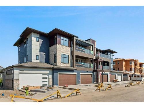 102-120 Marina Cove Se, Calgary, AB - Outdoor With Facade