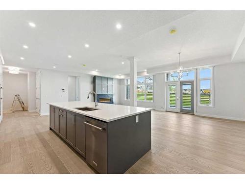 102-120 Marina Cove Se, Calgary, AB - Indoor Photo Showing Kitchen With Double Sink With Upgraded Kitchen