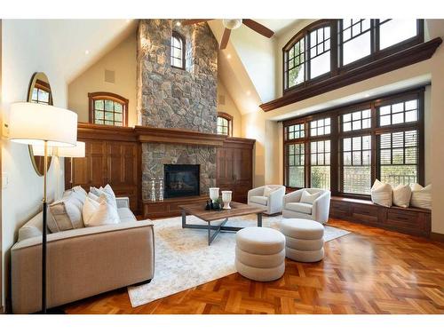 3 Aspen Ridge Court Sw, Calgary, AB - Indoor Photo Showing Living Room With Fireplace