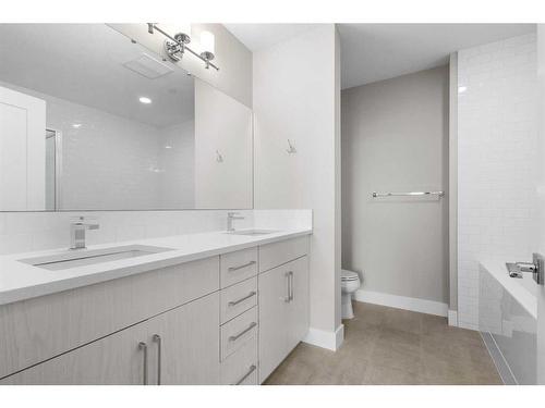 312-38 Quarry Gate Se, Calgary, AB - Indoor Photo Showing Bathroom