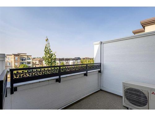 312-38 Quarry Gate Se, Calgary, AB - Outdoor With Exterior