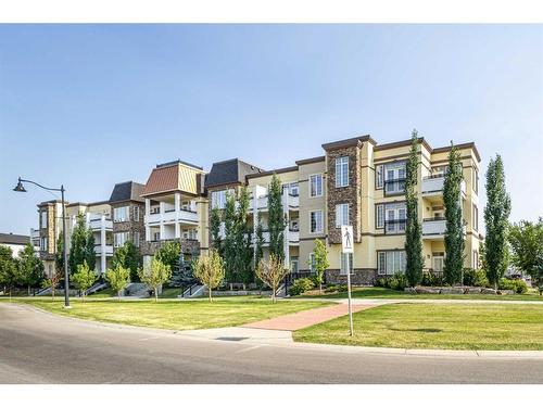 312-38 Quarry Gate Se, Calgary, AB - Outdoor With Facade