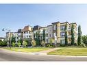 312-38 Quarry Gate Se, Calgary, AB  - Outdoor With Facade 