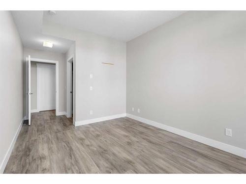 312-38 Quarry Gate Se, Calgary, AB - Indoor Photo Showing Other Room