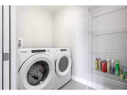 312-38 Quarry Gate Se, Calgary, AB - Indoor Photo Showing Laundry Room