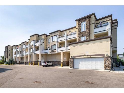 312-38 Quarry Gate Se, Calgary, AB - Outdoor With Facade