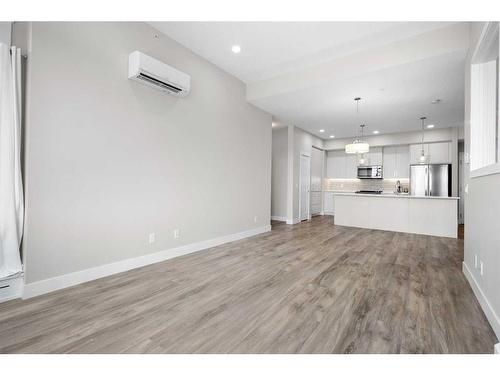 312-38 Quarry Gate Se, Calgary, AB - Indoor Photo Showing Kitchen