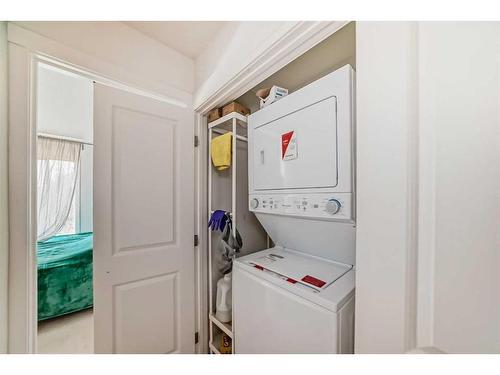 940 Sherwood Boulevard Nw, Calgary, AB - Indoor Photo Showing Laundry Room