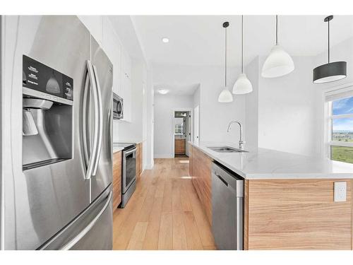 412-19621 40 Street, Calgary, AB - Indoor Photo Showing Kitchen With Double Sink With Upgraded Kitchen