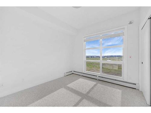 412-19621 40 Street, Calgary, AB - Indoor Photo Showing Other Room