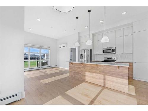 412-19621 40 Street, Calgary, AB - Indoor Photo Showing Kitchen With Upgraded Kitchen