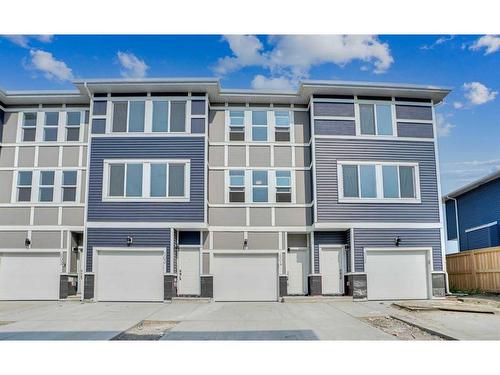 604-33 Merganser Drive, Chestermere, AB - Outdoor With Facade