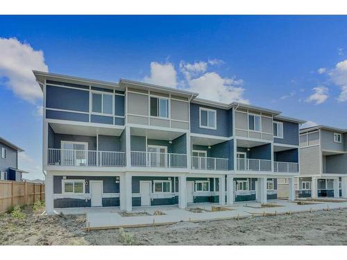 604-33 Merganser Drive, Chestermere, AB - Outdoor With Balcony With Facade