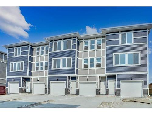 604-33 Merganser Drive, Chestermere, AB - Outdoor With Facade