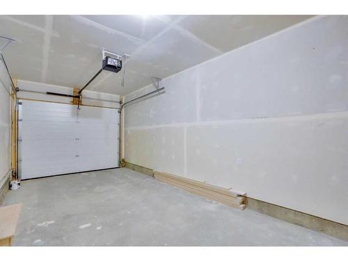 604-33 Merganser Drive, Chestermere, AB - Indoor Photo Showing Garage