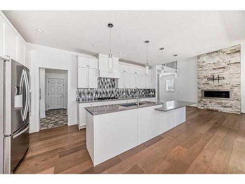 5 Sage Meadows Park Nw, Calgary, AB - Indoor Photo Showing Kitchen With Fireplace With Upgraded Kitchen