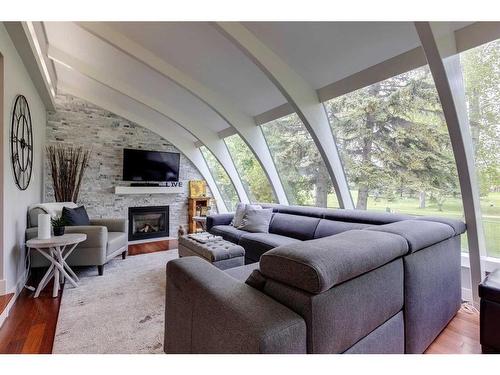 916 Mapleglade Drive Se, Calgary, AB - Indoor Photo Showing Living Room With Fireplace