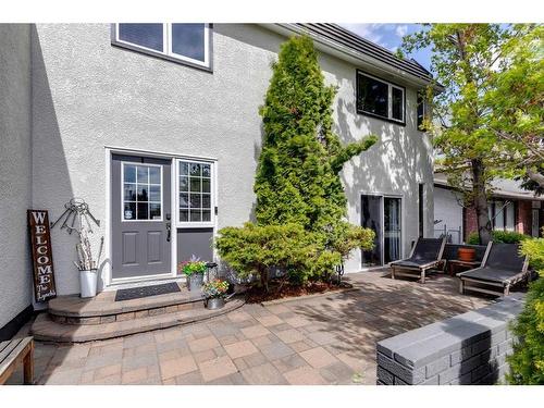 916 Mapleglade Drive Se, Calgary, AB - Outdoor With Deck Patio Veranda With Facade