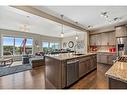 157 Sunset Point, Cochrane, AB  - Indoor Photo Showing Kitchen With Stainless Steel Kitchen With Upgraded Kitchen 