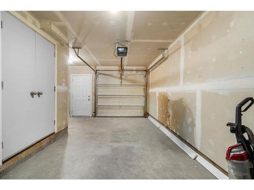 16 Stonehouse Crescent Nw, High River, AB - Indoor Photo Showing Garage