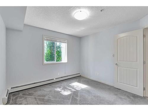 205-102 Cranberry Park Se, Calgary, AB - Indoor Photo Showing Other Room