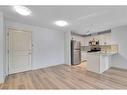 205-102 Cranberry Park Se, Calgary, AB  - Indoor Photo Showing Kitchen 