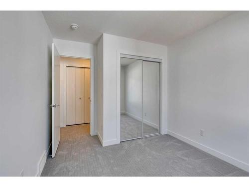 402-280 Chelsea Road, Chestermere, AB - Indoor Photo Showing Other Room