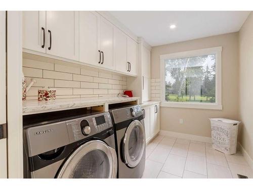 456 Wilderness Drive Se, Calgary, AB - Indoor Photo Showing Laundry Room