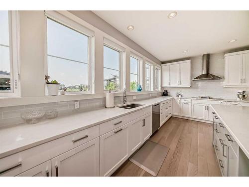 101 Cattail Run, Rural Rocky View County, AB - Indoor Photo Showing Kitchen With Double Sink