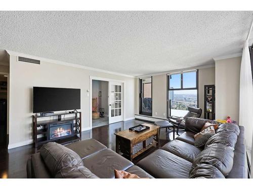 1505-1100 8 Avenue Sw, Calgary, AB - Indoor Photo Showing Living Room