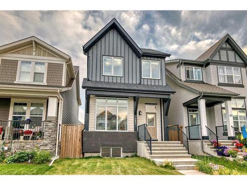 283 Masters Row Se, Calgary, AB - Outdoor With Deck Patio Veranda With Facade